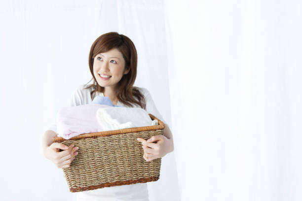 istock Washer woman with a basket. 845007620
