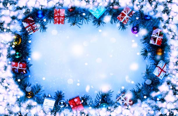 istock Frame. Toned image. Christmas background with decorations and gift boxes on wooden board 845016538