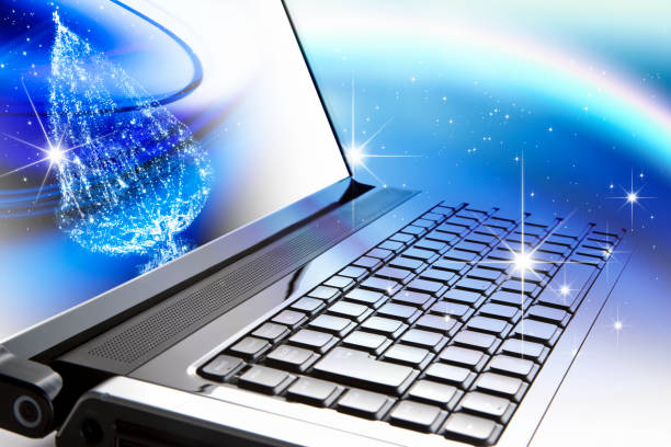 istock Laptop computer reflects the starry sky and the Christmas tree 845031100