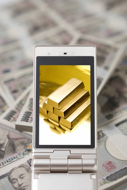 Money on the mobile screen and WAD Money on the mobile screen and WAD buy gold silver bullion online stock pictures, royalty-free photos & images