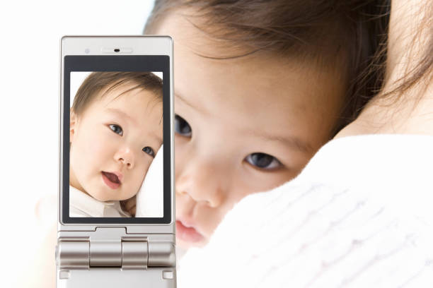 istock Baby on the phone 845042246