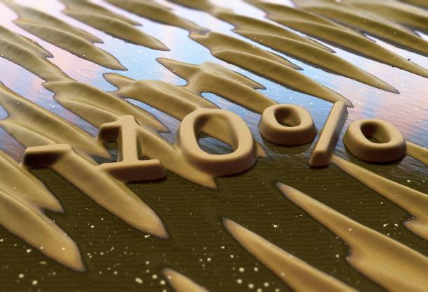 istock Ten percent reduction written on sand. 845048592