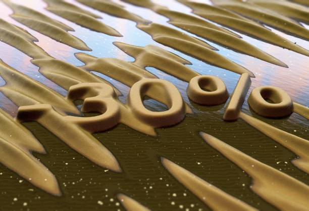 istock Thirty percent reduction written on sand. 845048686