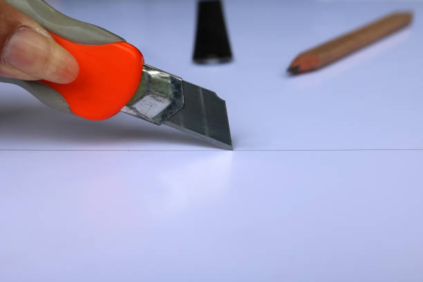 istock Knife cutter cut down on the lines 845058182