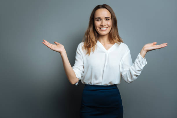 istock Cheerful nice woman holding her hands up 845064614