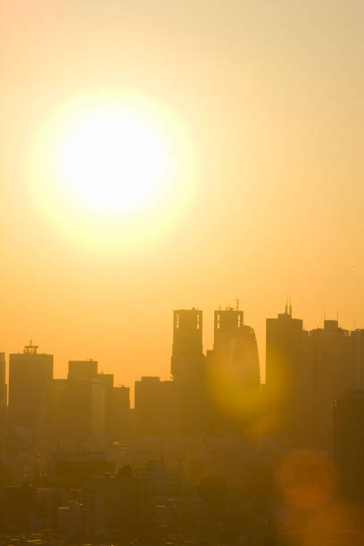 istock Shinjuku skyscrapers and Sun 845069204