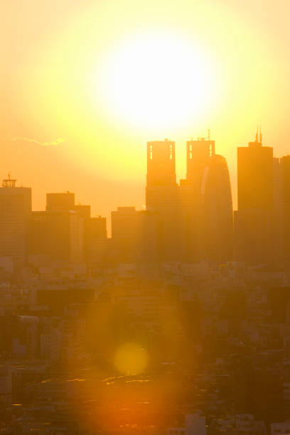istock Shinjuku skyscrapers and Sun 845069266