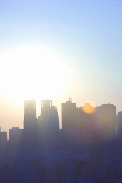 istock Shinjuku skyscrapers and Sun 845069292
