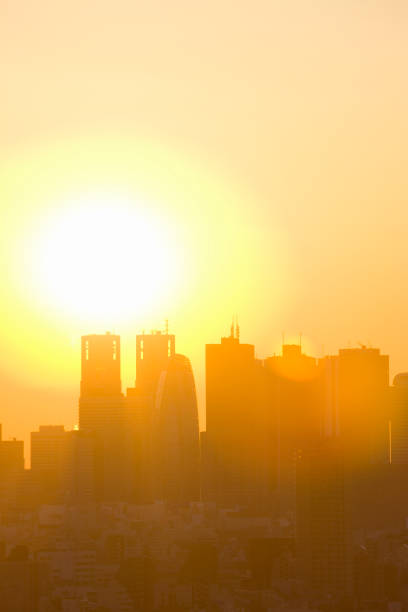 istock Shinjuku skyscrapers and Sun 845069304