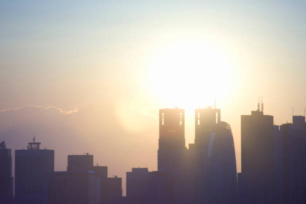 istock Shinjuku skyscrapers and Sun 845069336