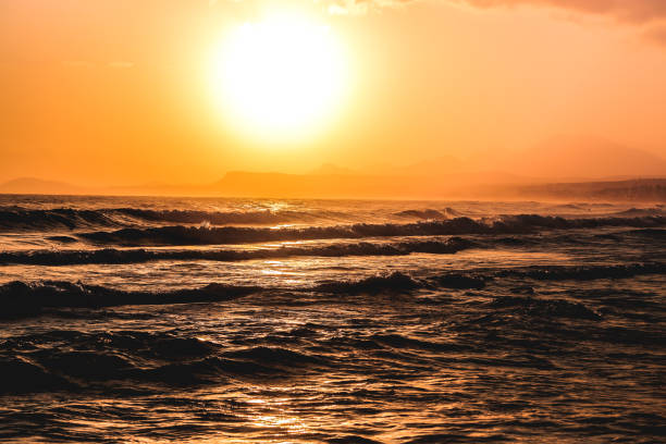 istock Sunrise over beach in Rethimnon, Crete, Greece 845070978