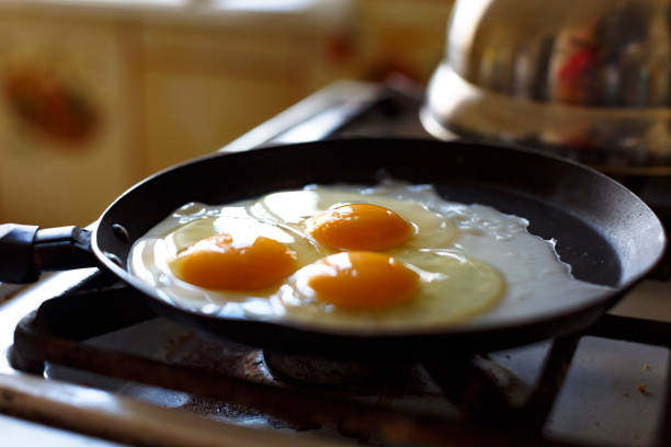 istock Eggs fry in a frying pan 845074170