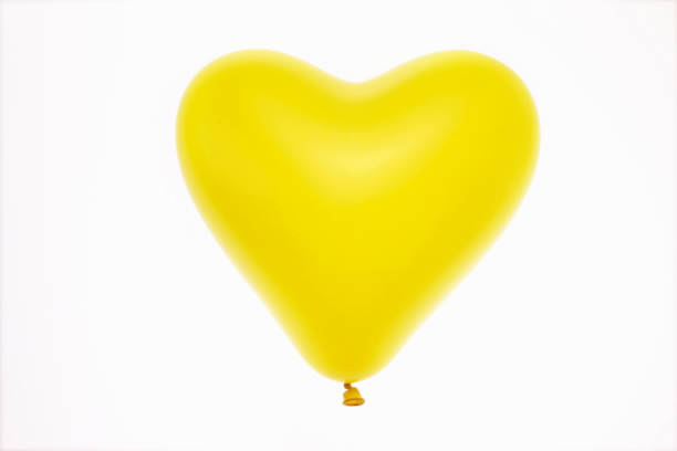 istock Yellow heart balloons 845079632