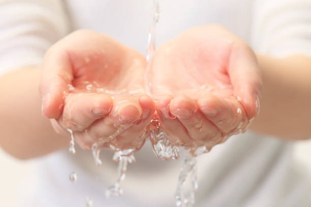 Hand and water Hand and water water conservation photos stock pictures, royalty-free photos & images