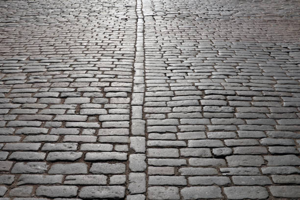 istock Abstract background of old cobblestone pavement 845089390