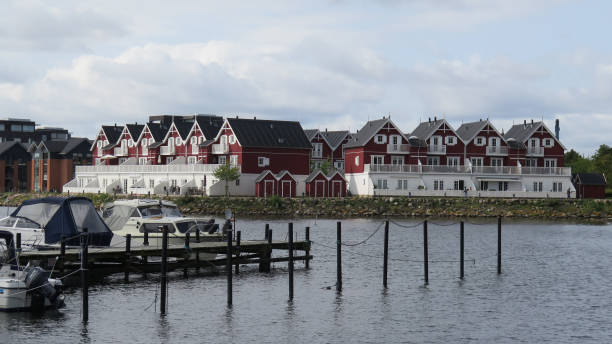 istock Wooden houses on water front 845093754