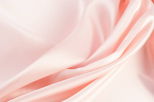 istock The texture of the silk fabric, soft pink 845107844