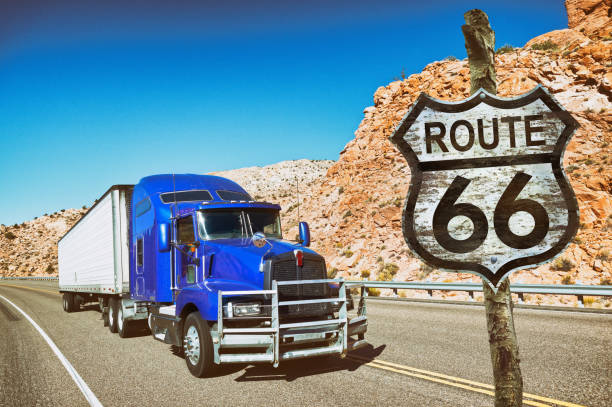 istock Blue truck with container driving on route 66 845111010