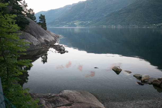 istock Norway - ideal fjord reflection in clear water 845111110
