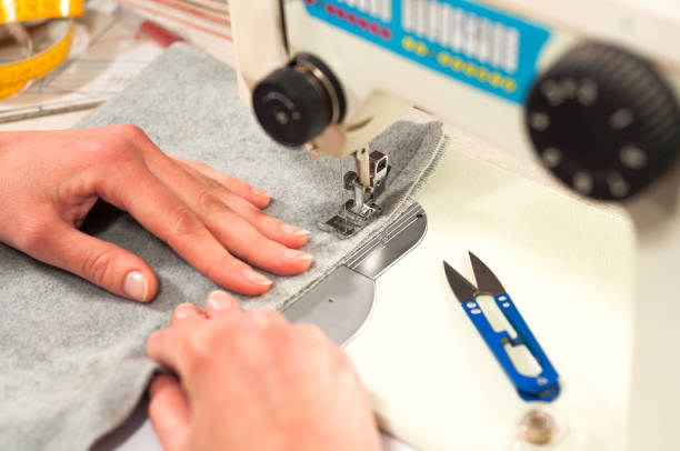 istock processes of sewing on the sewing machine sew women's hands sewing machine 845112170