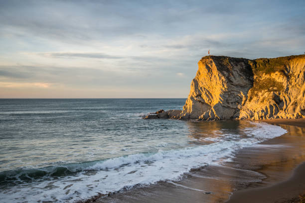 Sopelana beach rock at dusk Sopelana beach rock at dusk, Basque Country sopelana stock pictures, royalty-free photos & images
