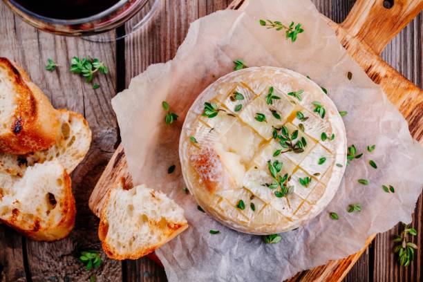 istock Baked camembert with toasts and thyme 845125400