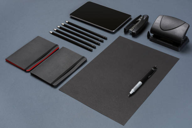 istock Set of black office stationery on a gray background, flat lay 845126036