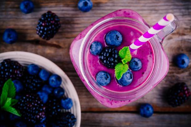 istock blueberry and blackberry smoothie in mason jar view from above 845126500