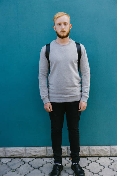 istock Man  with backpack on the cerulean blue   background 845130840