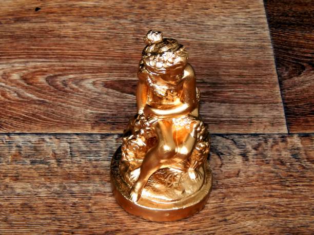 istock Golden antique statuette after restoration 845142880