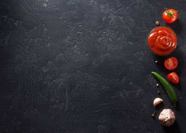 istock Tomato sauce on wooden background 845145600