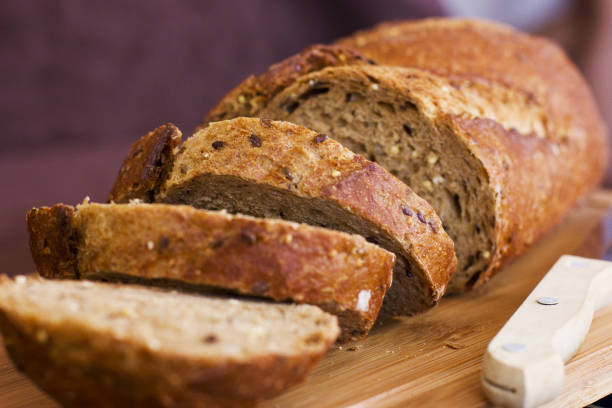 istock Rye bread with cereals on wooden table 845145644