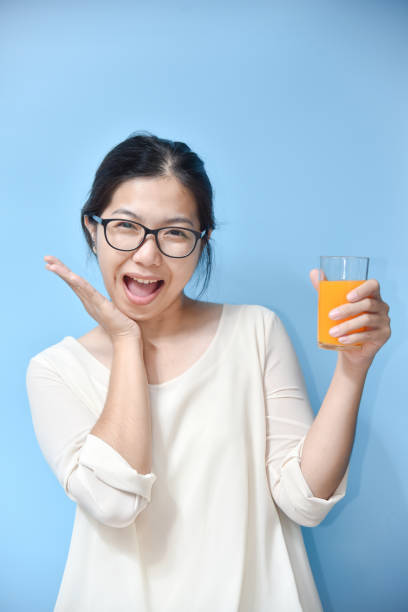 istock Woman with Orange juice. 845151742