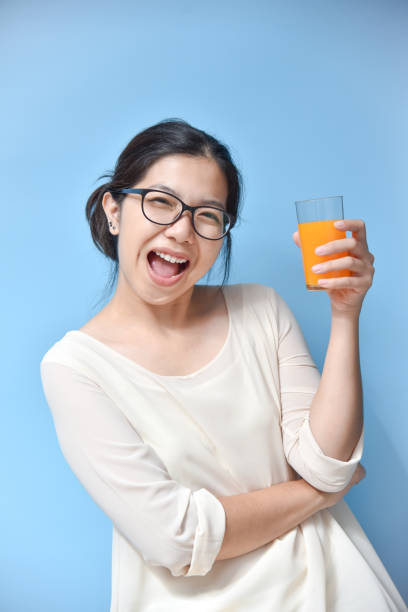 istock Woman with Orange juice. 845151782