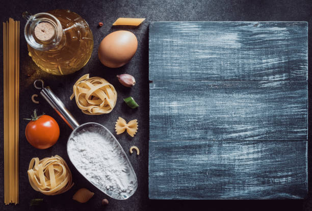 istock Pasta and food ingredient on table 845153556