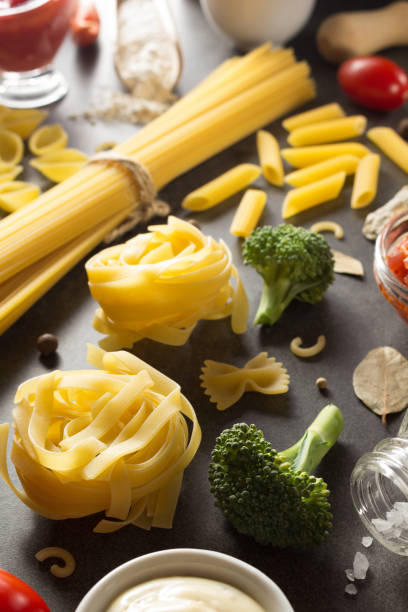 istock Pasta and food ingredient on table 845154338