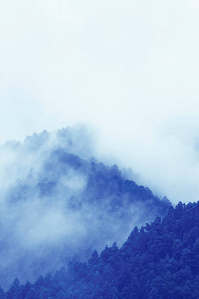 istock Mountain shrouded in fog 845159652