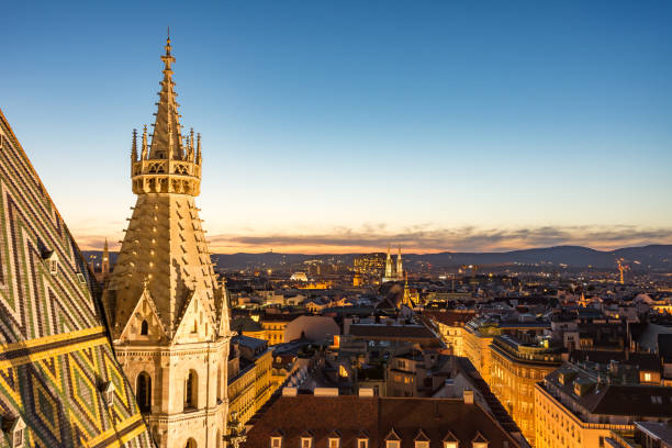 Stephansdom cathedral and aerial view over Vienna at night stock photo