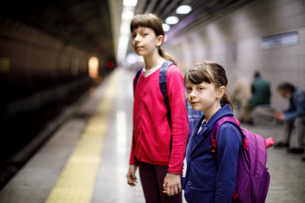 istock Young travellers waiting for subway train 845160904