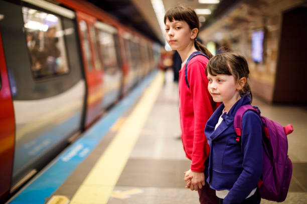istock Young travellers waiting for subway train 845161684