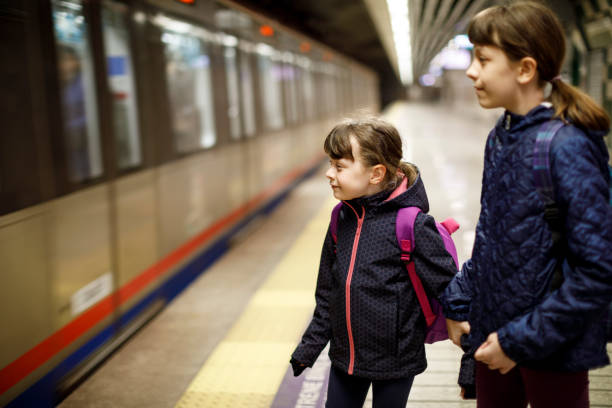 istock Young travellers waiting for subway train 845163970