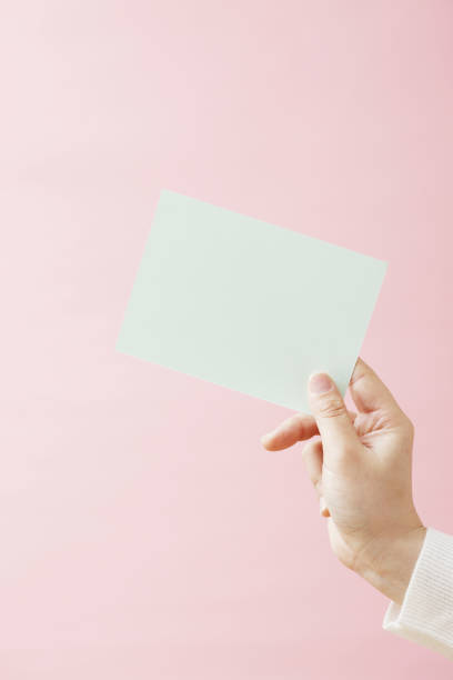 istock Woman with a blue card 845174564
