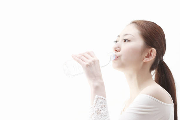 istock Woman drinking water 845179388