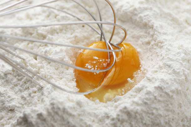 istock Flour, egg yolk and whisk 845180504