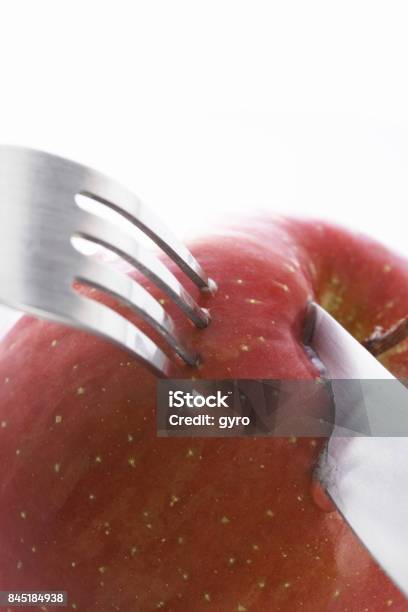 Apple With Fork Stock Photo - Download Image Now - Apple - Fruit, Beauty, Crockery