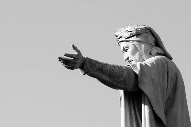 Statue of Dante Alighieri in a public acquare of Naples in the city centre