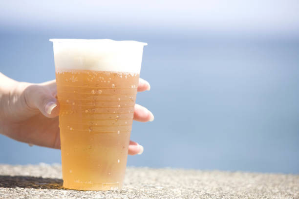 Women drink beer in hand