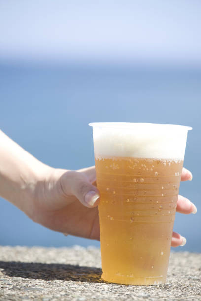 Women drink beer in hand