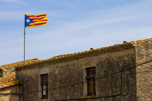 Catalonian Flag above a rural house stock photo
