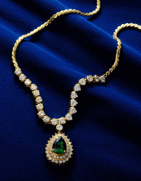 istock Placed in blue velvet diamond and Emerald pendant 845199426